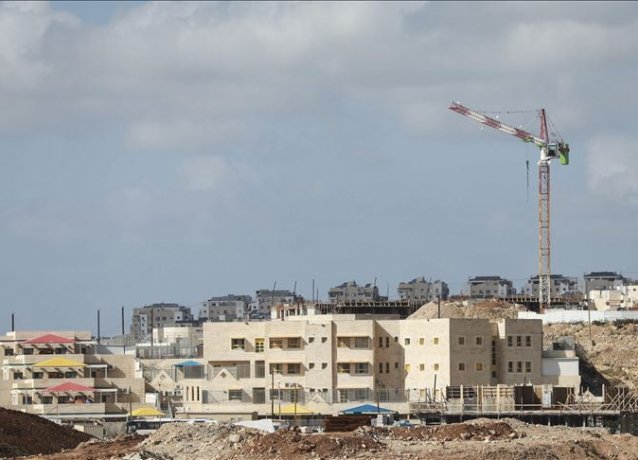 Еврейские поселенцы строят незаконные поселения  на Западном берегу