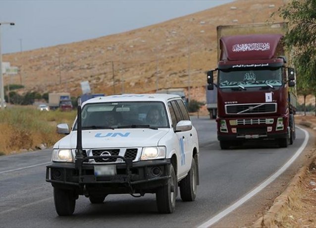 Грузовики доставляют гуманитарную помощь в Идлиб