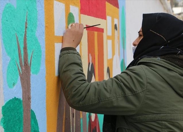 Сирия: Молодежь разрисовывает стены граффити,символизирующими мир
